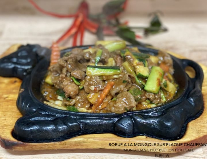 Mongolian-style beef on a sizzling plate