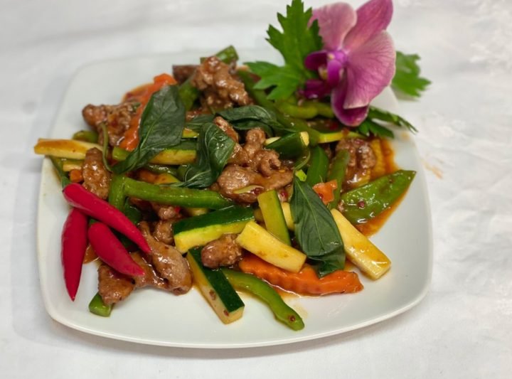 Spicy stir-fried beef with Thai basil