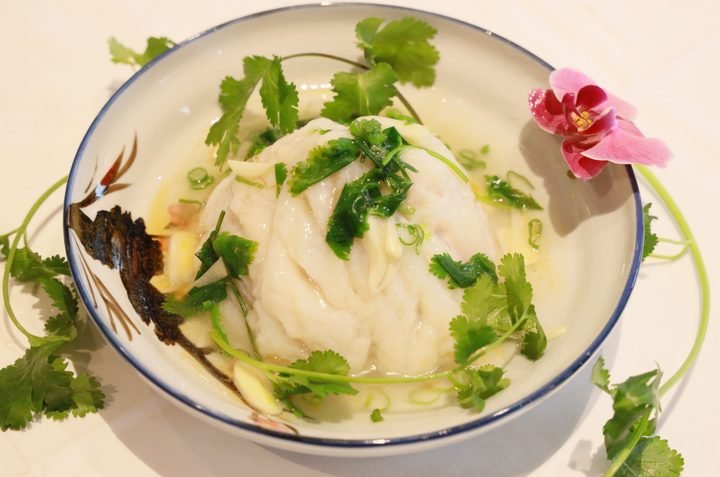 Chef’s steamed fish fillet with parsley and garlic