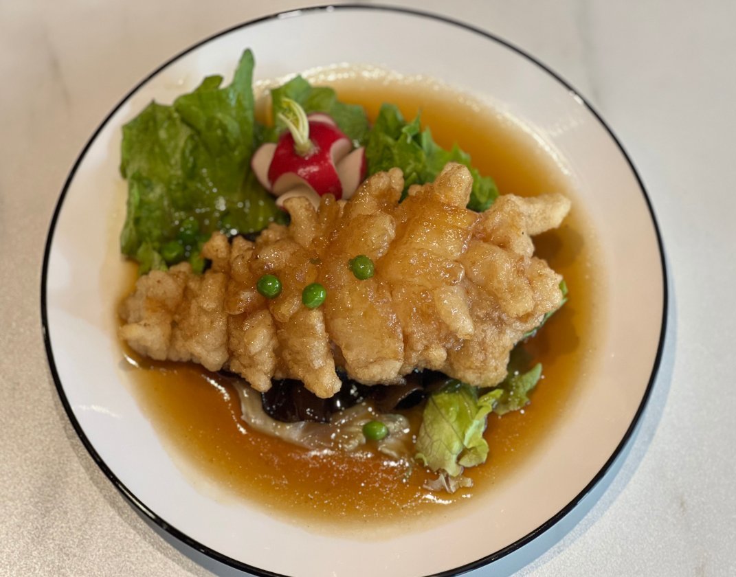 Stir-fried fish fillet caramelised with rice wine